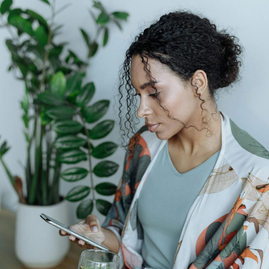 woman looking at her phone